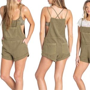 Olive-drab Billabong “Wild Pursuit” overall shorts